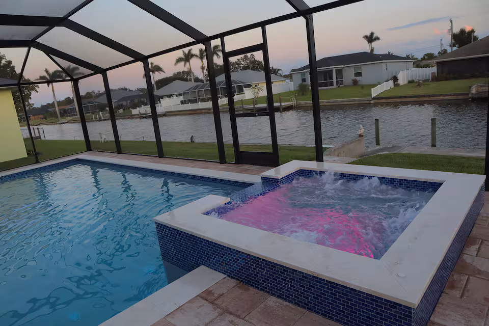Crescent Moon pool and canal on a sunny Cape Coral day